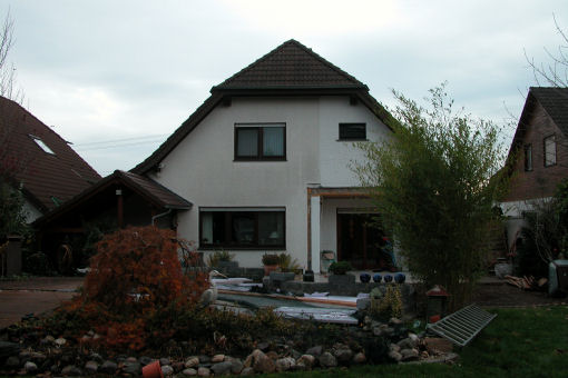 Der Blick in den Garten vor dem Hausanbau durch die Kessler - Bau GmbH & Co. KG