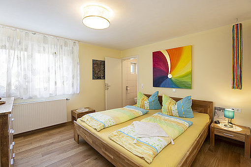 Schlafzimmer nach dem Umbau, Wohnraummodernisierung, Zimmerei Hauser GmbH & Co. KG